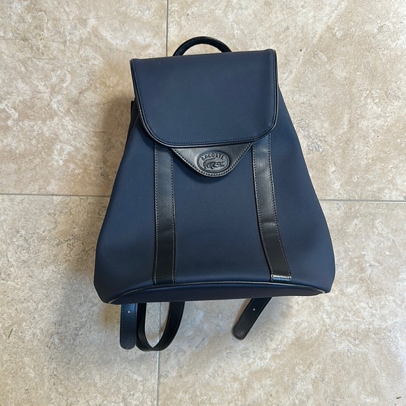 Lacoste Handbags - Lacoste navy backpack NWOT